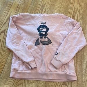 Kids pink Puma hoodie sweatshirt.